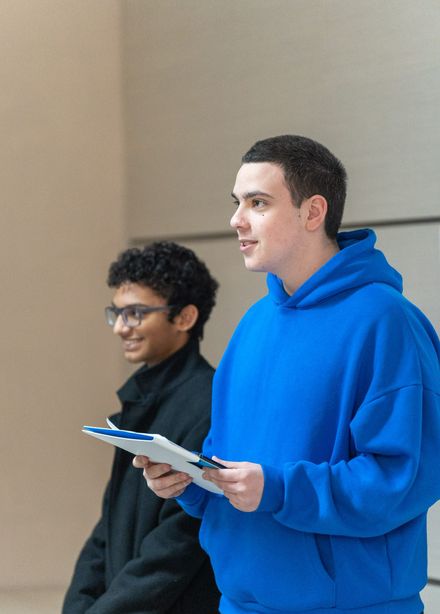 Two Clever School students presenting from their notes