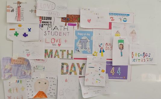 Pupils' drawings on the wall for Math Day